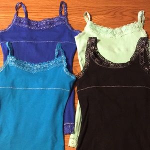 Lot of 4 Justice tank tops.